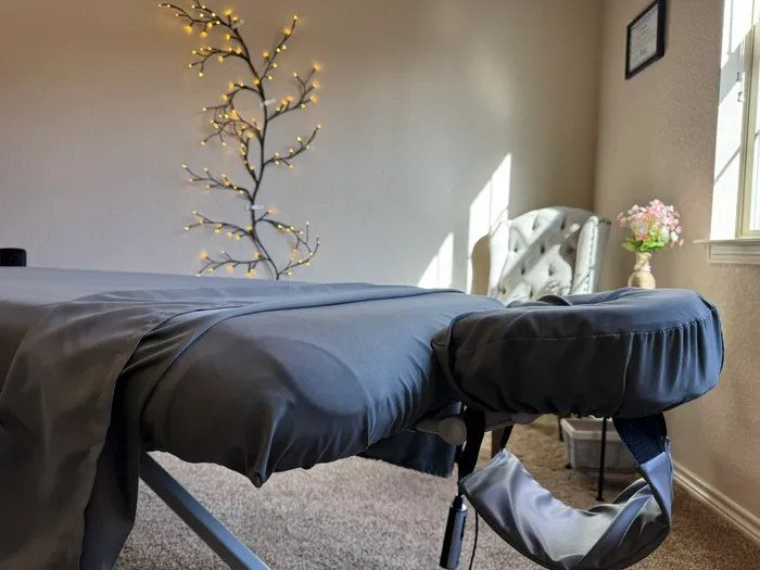 Massage table by the window