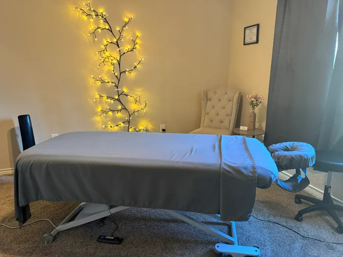 Massage table and chair in the studio