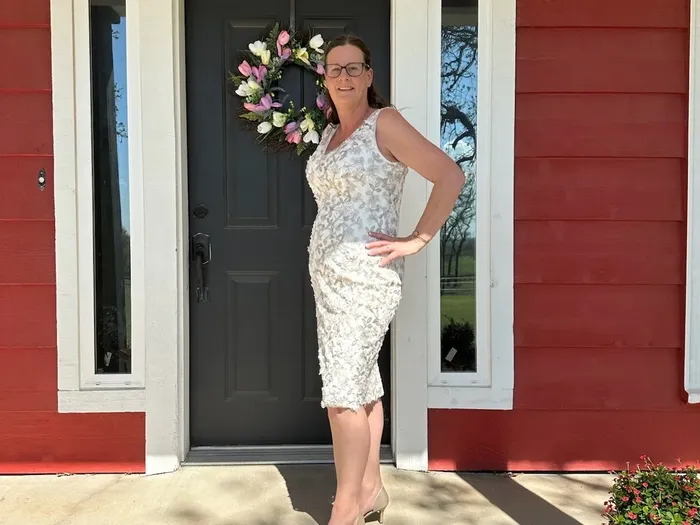 Standing at the front door of the studio